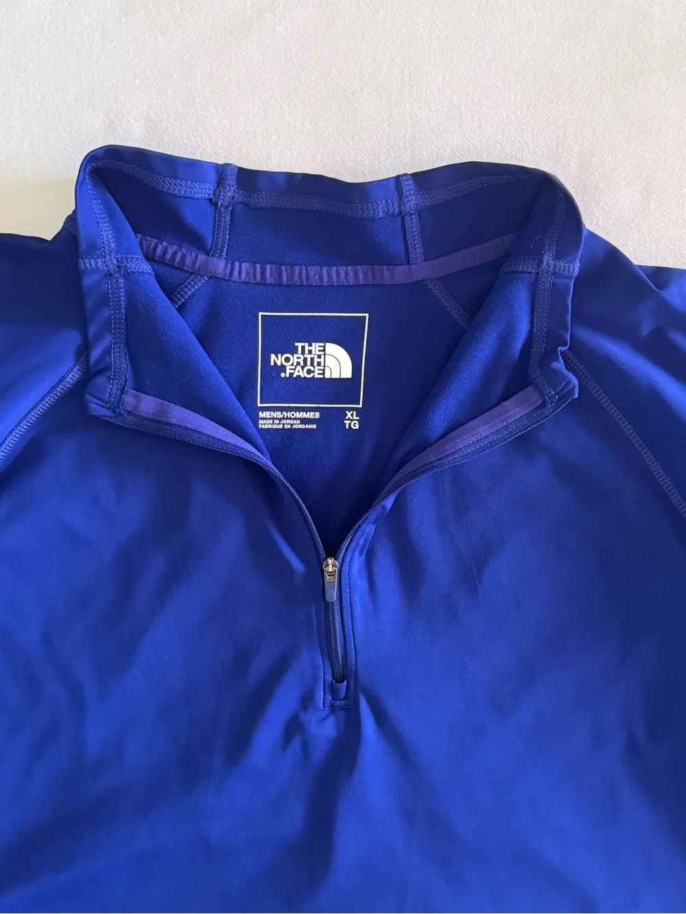 The North Face men's XL long sleeved thick dri-fit top in royal blue. EUC.